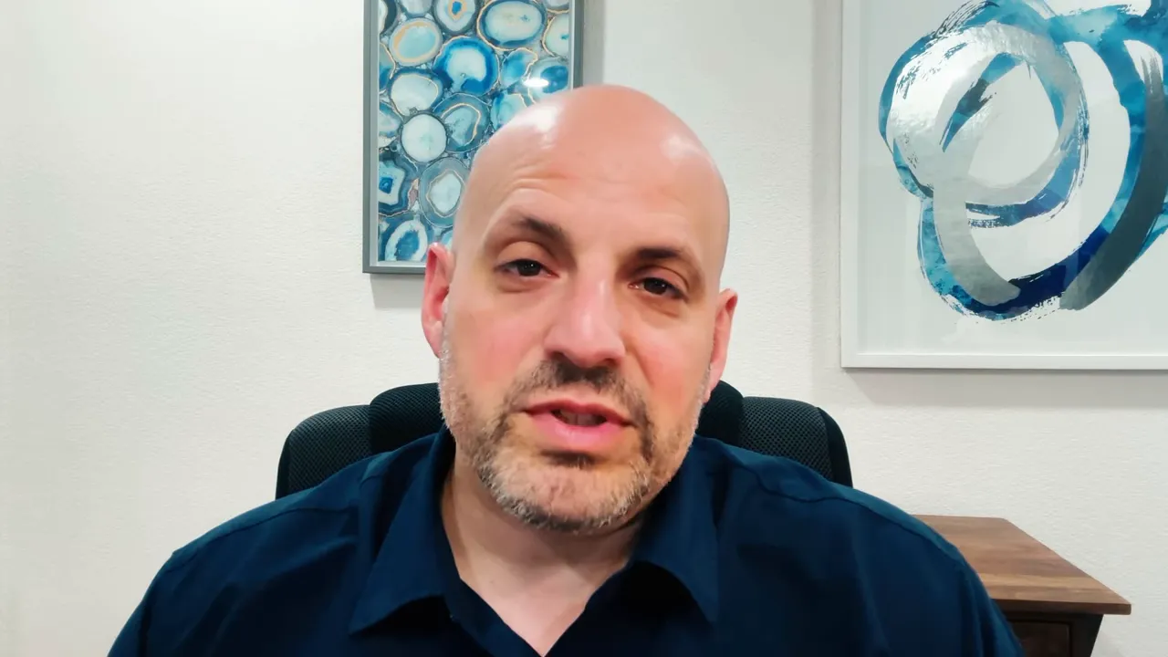 Presenter mid-shot summarizing final takeaways about managed franchise ownership