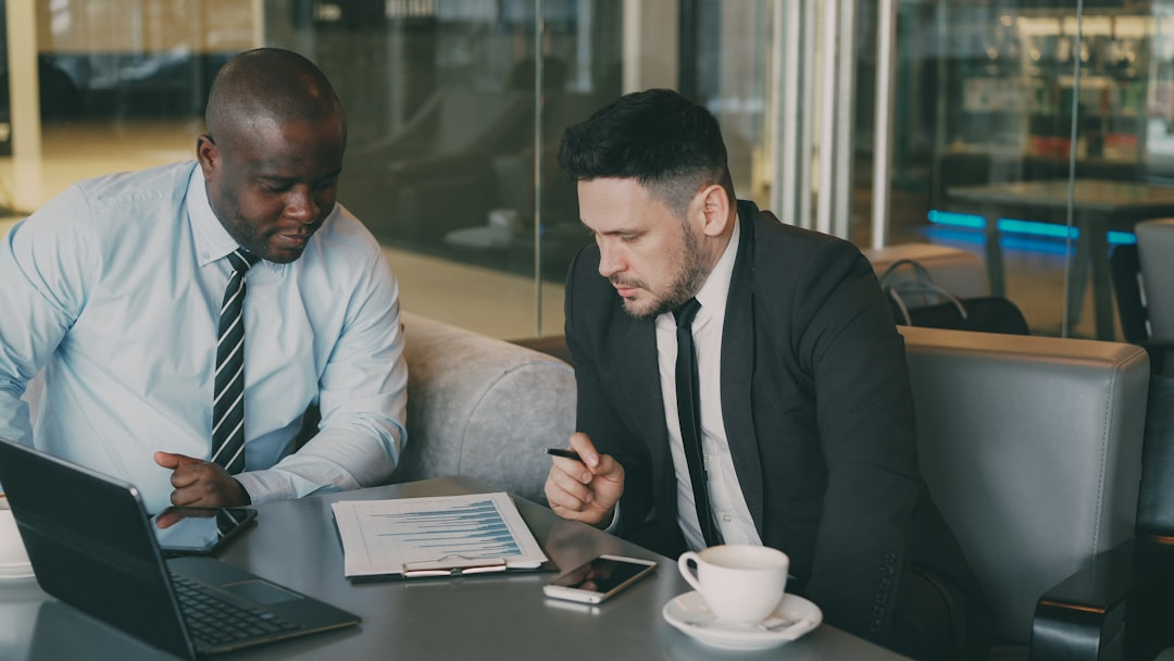 entrepreneur reviewing finances with advisor