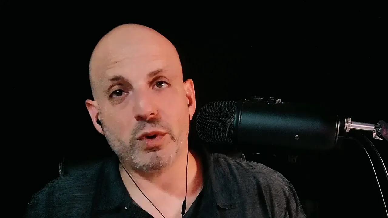 podcast host clearly framed with a microphone against a black background, speaking about financing options