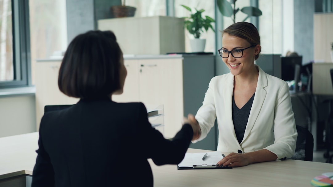 business acquisition handshake office