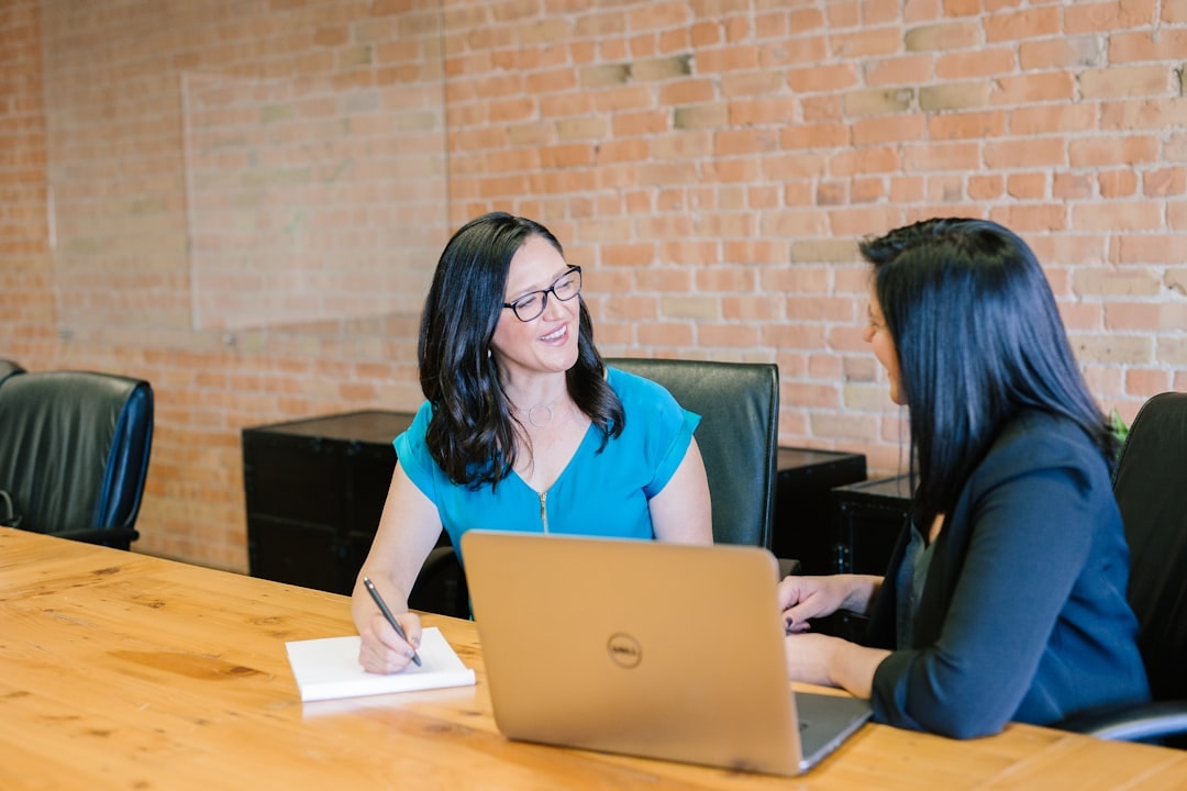 business coach meeting with laptop strategy