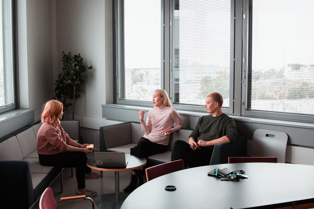 business coaching meeting team around table