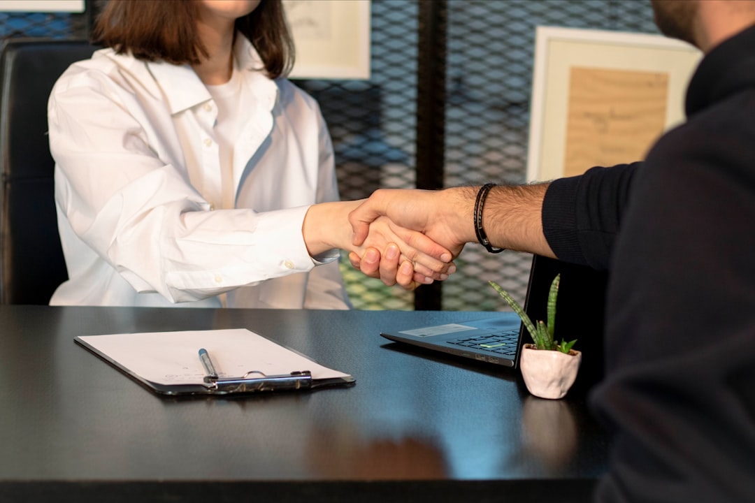 business loan approval meeting handshake financial advisor