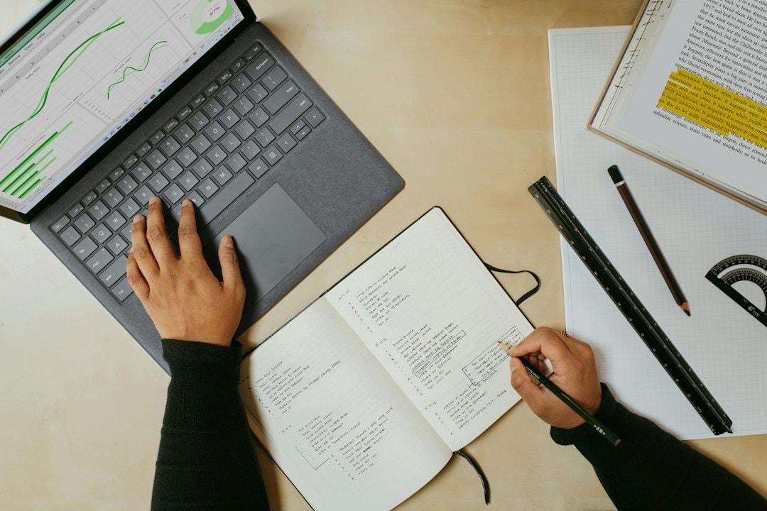 business ownership planning laptop documents desk