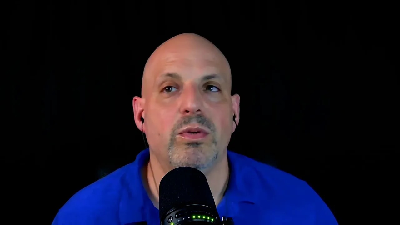 Business coach discussing low-cost home-based franchise models on camera