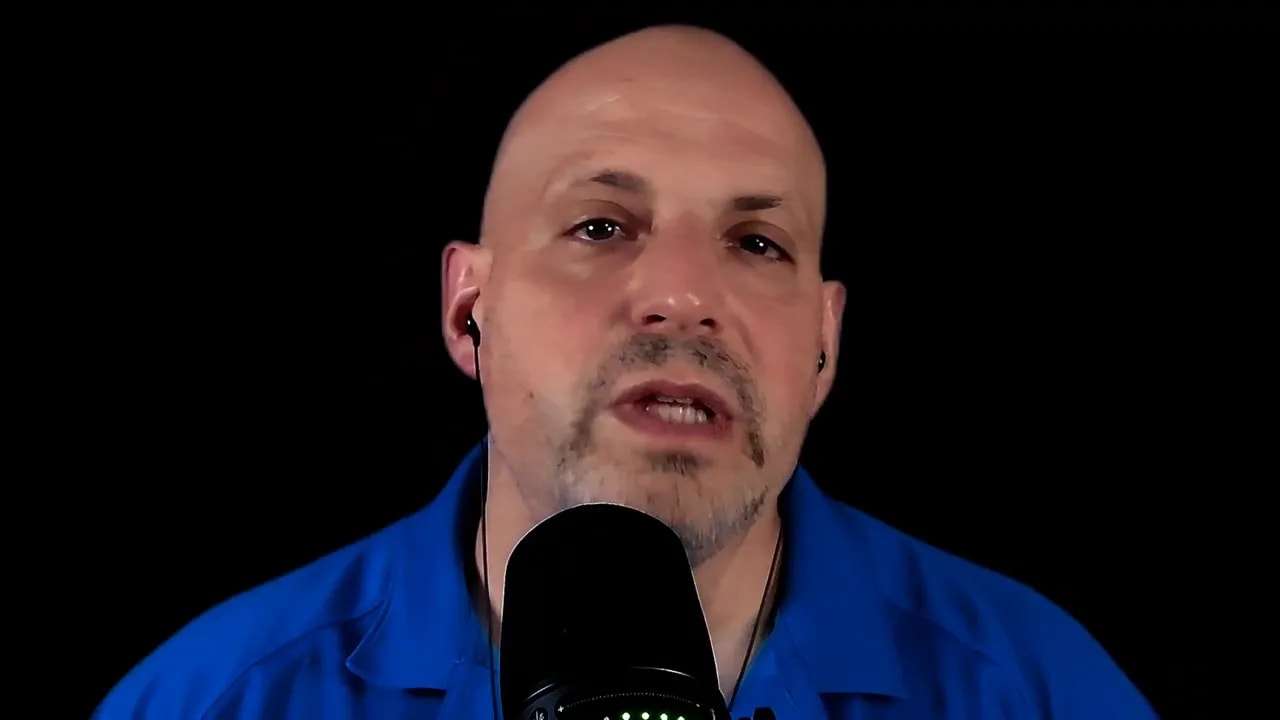 Business ownership podcast host speaking into a microphone
