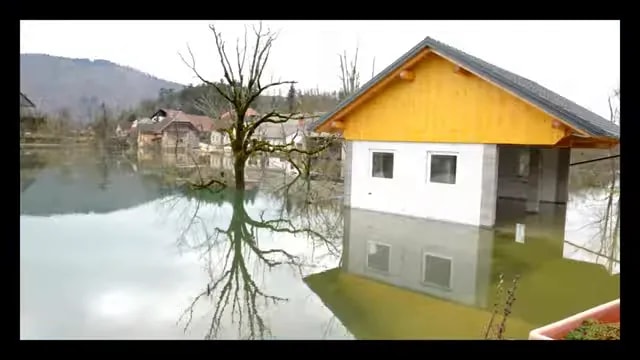 House surrounded by floodwater