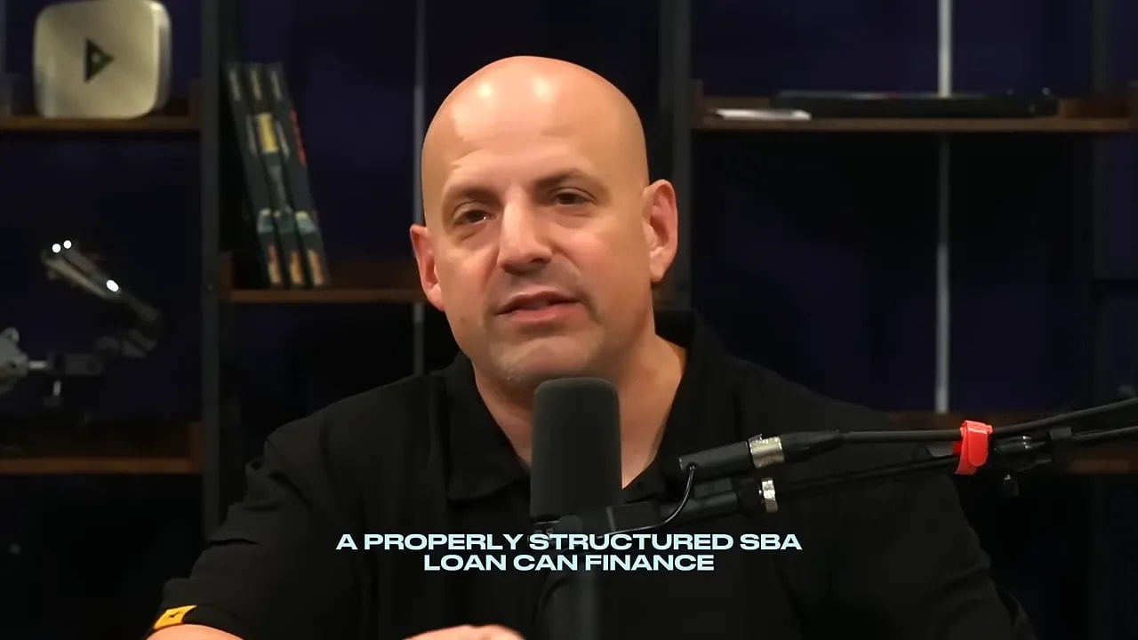 On-screen text reading Franchise Fee beside a presenter