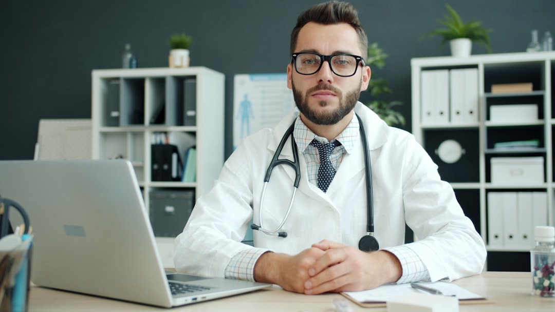 nurse doctor staffing agency paperwork laptop