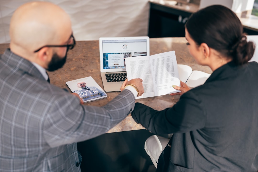 real estate investor business meeting laptop