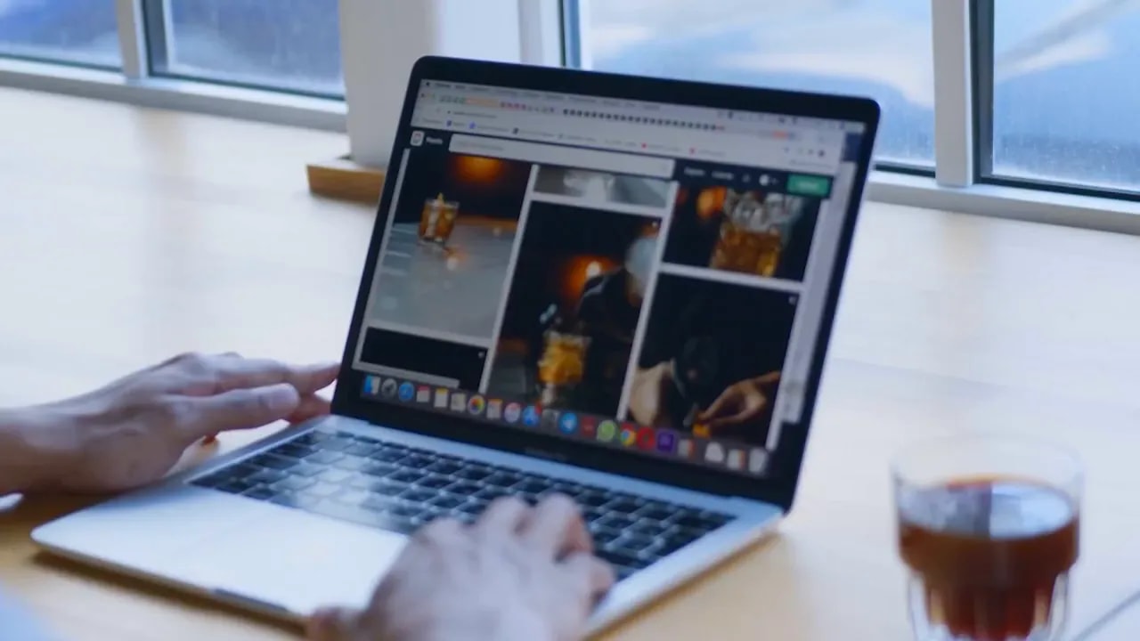 Person reviewing franchise operations planning on a laptop in an office setting