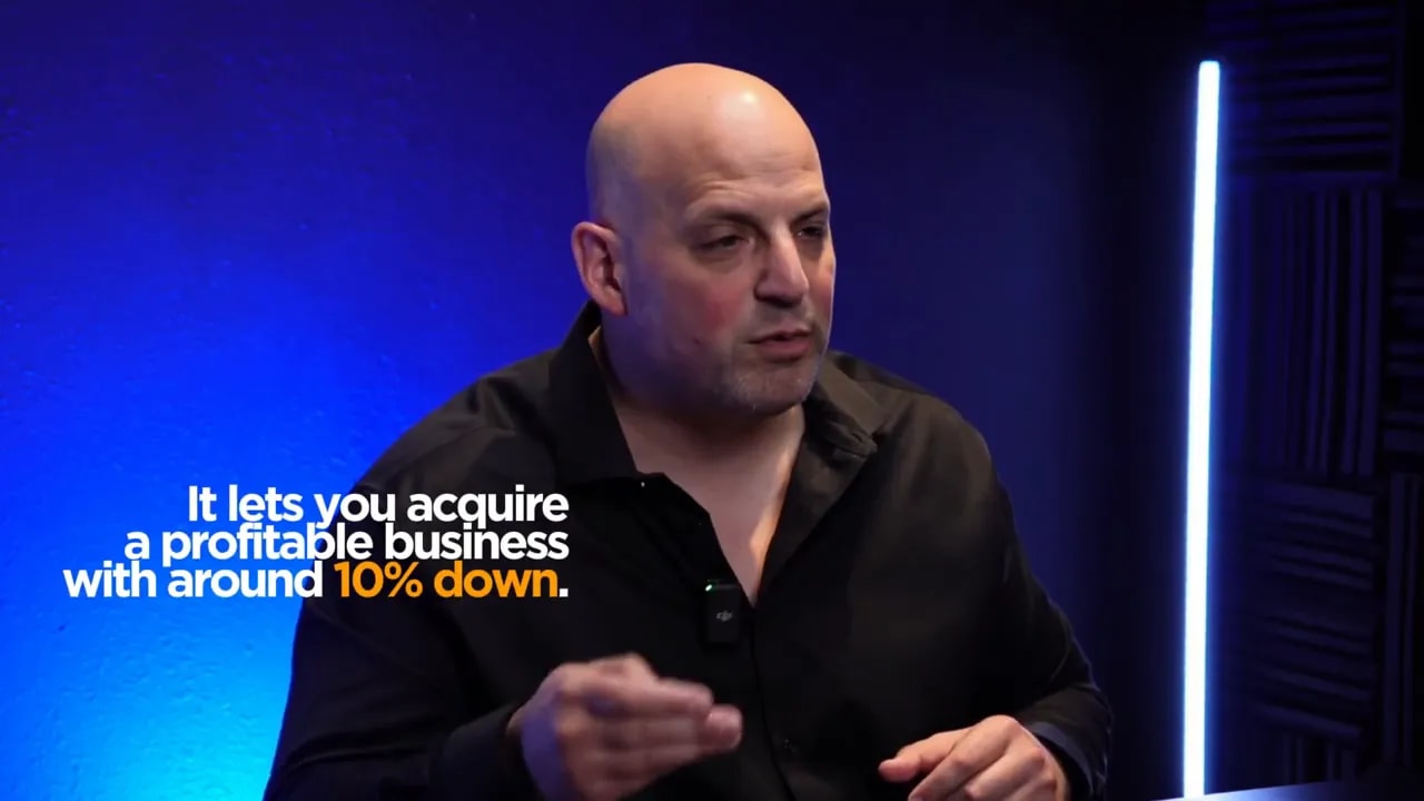 On-screen text explaining acquisition of a profitable business with around 10 percent down